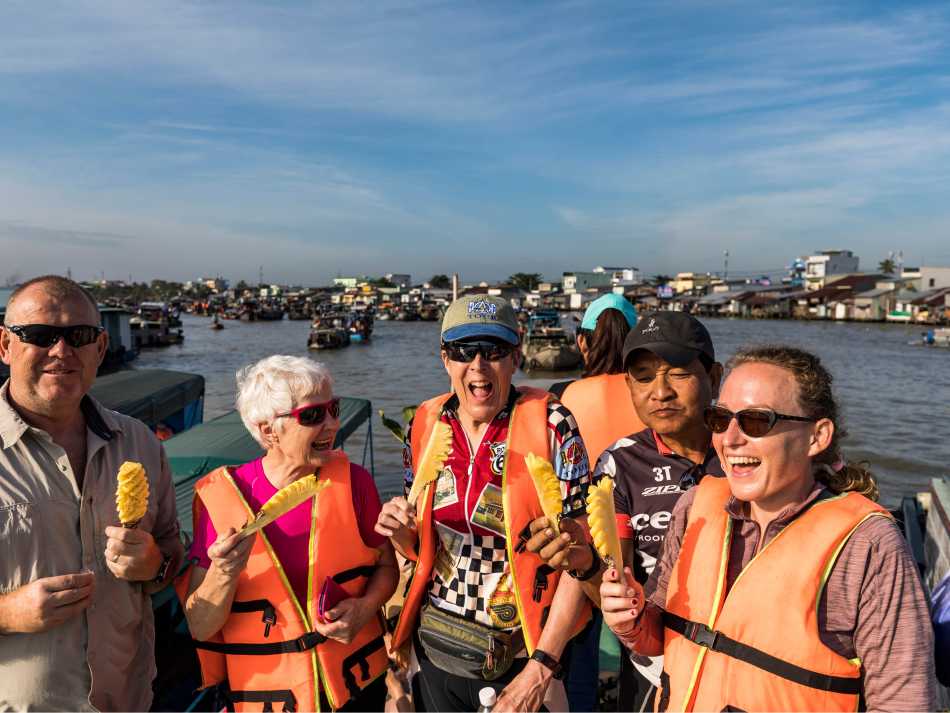 Enjoying fresh pineapple along the Mekong Delta | Lachlan Gardiner