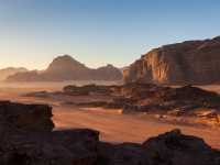 Wadi Rum's desert landscape at sunrise |  Richard I'Anson